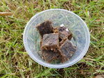 Close up of Erayz non-toxic jerky blocks - a lure for stoat, ferret, weasel, and rodent control.