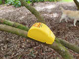 D-Rat Supervisor shroud on a D-Rat trap for rodent control - sitting on a branch of a tree.